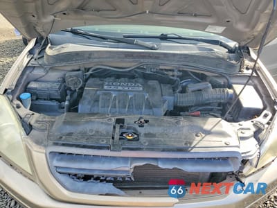 Zdjęcie 12 z 13 samochodu: 2005 HONDA PILOT EXL VIN:5FNYF185X5B034303 - miniatura