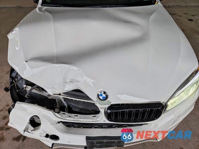 Zdjęcie 12 z 13 samochodu: 2014 BMW X5 XDRIVE35I VIN:5UXKR0C51E0K47863 - miniatura