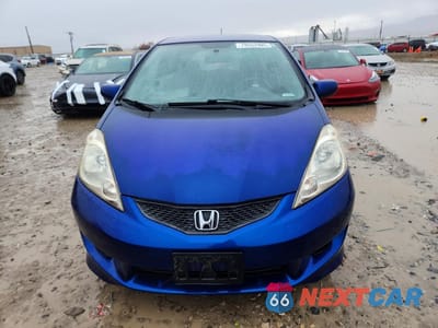 Piąte zdjęcie samochodu w środku: 2010 HONDA FIT SPORT VIN:JHMGE8H48AS023312 - miniatura