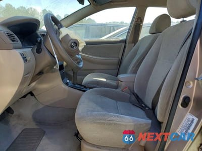 Zdjęcie 7 z 11 samochodu: 2003 TOYOTA COROLLA CE VIN:1NXBR32E83Z134918 - miniatura