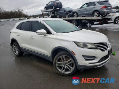 Czwarte zdjęcie samochodu z boku: 2015 LINCOLN MKC VIN:5LMCJ2A91FUJ35730 - miniatura