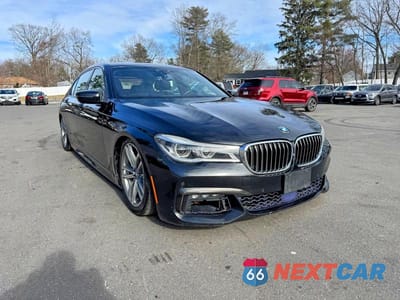 Czwarte zdjęcie samochodu z boku: 2017 BMW 750 XI VIN:WBA7F2C58HG422355 - miniatura