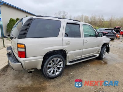 Trzecie zdjęcie samochodu z tyłu: 2004 GMC YUKON DENALI VIN:1GKEK63U24J240317 - miniatura