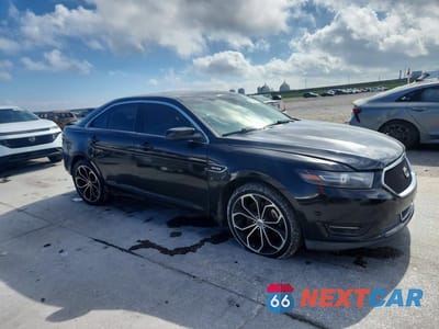 Czwarte zdjęcie samochodu z boku: 2013 FORD TAURUS SHO VIN:1FAHP2KT1DG153734 - miniatura