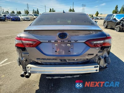 Zdjęcie 6 z 12 samochodu: 2022 TOYOTA CAMRY HYBRID XSE VIN:4T1K31AK1NU574267 - miniatura