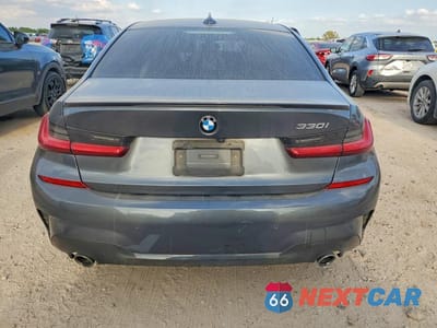 Zdjęcie 6 z 12 samochodu: 2021 BMW 330I VIN:3MW5R1J05M8C01997 - miniatura
