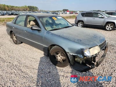 Czwarte zdjęcie samochodu z boku: 1999 TOYOTA AVALON XLS VIN:4T1BF18B4XU320455 - miniatura