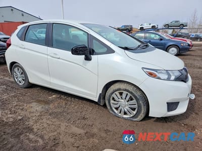 Czwarte zdjęcie samochodu z boku: 2015 HONDA FIT LX VIN:3HGGK5H51FM105966 - miniatura