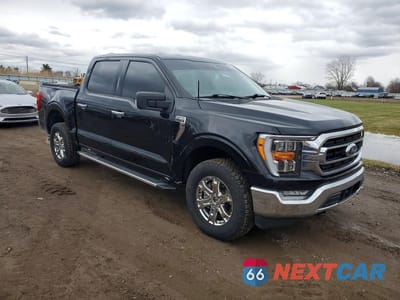 Czwarte zdjęcie samochodu z boku: 2022 FORD F150 SUPERCREW VIN:1FTFW1E86NFB03568 - miniatura