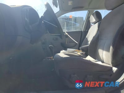 Zdjęcie 7 z 12 samochodu: 2004 KIA SPECTRA BASE VIN:KNAFB121645318498 - miniatura