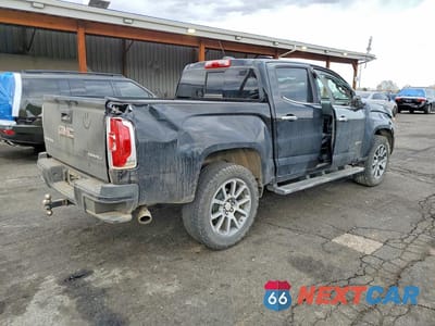 Trzecie zdjęcie samochodu z tyłu: 2018 GMC CANYON DENALI VIN:1GTG6EEN3J1223658 - miniatura
