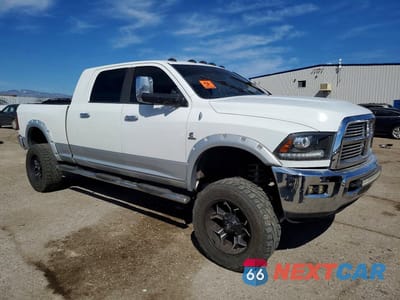 Czwarte zdjęcie samochodu z boku: 2012 DODGE RAM 2500 LARAMIE VIN:3C6UD5NL1CG316116 - miniatura