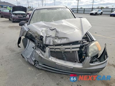 Piąte zdjęcie samochodu w środku: 2004 HYUNDAI ACCENT BASE VIN:KMHCF35C54U299849 - miniatura