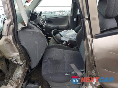 Zdjęcie 7 z 14 samochodu: 2003 CHEVROLET TRACKER VIN:2CNBJ13C336946263 - miniatura