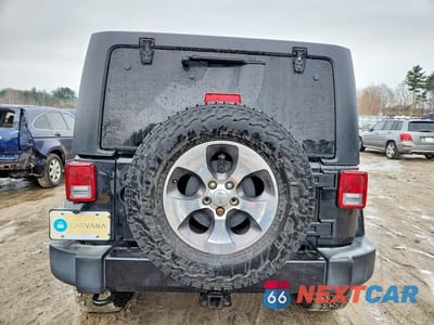 Zdjęcie 6 z 13 samochodu: 2016 JEEP WRANGLER UNLIMITED SAHARA VIN:1C4BJWEG9GL347155 - miniatura
