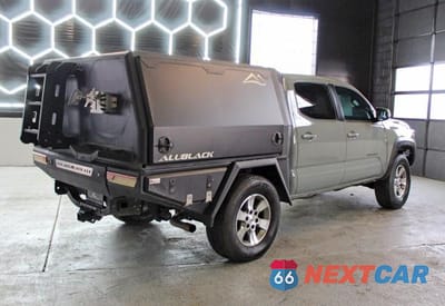 Trzecie zdjęcie samochodu z tyłu: 2022 TOYOTA TACOMA TRD OFF-ROAD VIN:3TMCZ5AN8NM532157 - miniatura