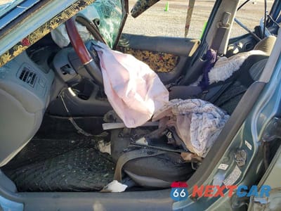 Zdjęcie 7 z 12 samochodu: 2000 HONDA CIVIC BASE VIN:2HGEJ6610YH559983 - miniatura
