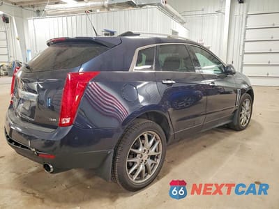 Trzecie zdjęcie samochodu z tyłu: 2014 CADILLAC SRX PREMIUM COLLECTION VIN:3GYFNGE35ES580508 - miniatura