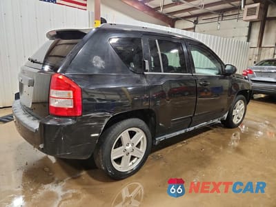Trzecie zdjęcie samochodu z tyłu: 2010 JEEP COMPASS SPORT VIN:1J4NF4FB4AD582659 - miniatura