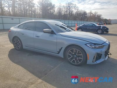 Czwarte zdjęcie samochodu z boku: 2024 BMW M440XI GRAN COUPE VIN:WBA13AW09RFT41462 - miniatura