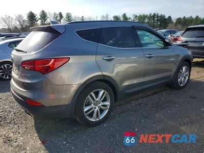 Trzecie zdjęcie samochodu z tyłu: 2014 HYUNDAI SANTA FE SPORT 2.0T VIN:5XYZU3LA7EG185229 - miniatura