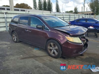 Czwarte zdjęcie samochodu z boku: 2011 HONDA ODYSSEY EXL VIN:5FNRL5H6XBB009121 - miniatura