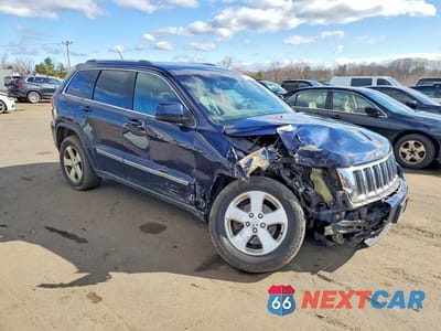 Czwarte zdjęcie samochodu z boku: 2012 JEEP GRAND CHEROKEE LAREDO VIN:1C4RJFAG3CC350051 - miniatura