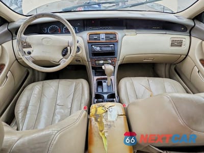 Zdjęcie 8 z 12 samochodu: 2000 TOYOTA AVALON XLS VIN:4T1BF28B9YU108156 - miniatura