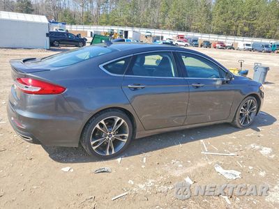 Trzecie zdjęcie samochodu z tyłu: 2020 FORD FUSION TITANIUM VIN:3FA6P0D9XLR133809 - miniatura