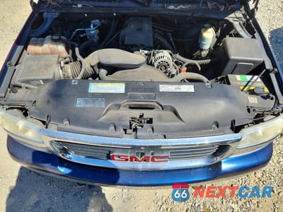 Zdjęcie 11 z 12 samochodu: 2000 GMC NEW SIERRA C1500 VIN:1GTEC19T7YZ159296 - miniatura