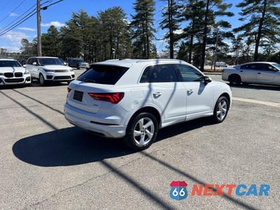 Czwarte zdjęcie samochodu z boku: 2020 AUDI Q3 PREMIUM VIN:WA1AECF34L1033827 - miniatura