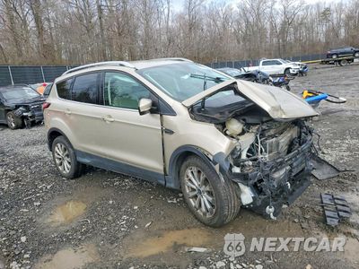 Czwarte zdjęcie samochodu z boku: 2017 FORD ESCAPE TITANIUM VIN:1FMCU9JD4HUD82072 - miniatura