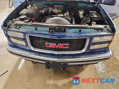 Zdjęcie 11 z 12 samochodu: 1997 GMC SIERRA K1500 VIN:2GTEK19R8V1502483 - miniatura