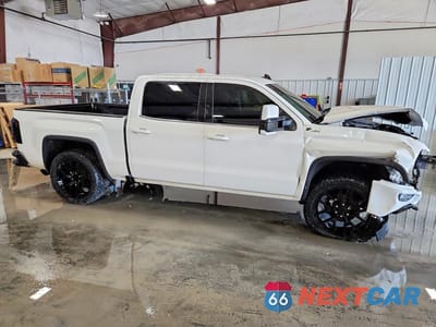 Czwarte zdjęcie samochodu z boku: 2018 GMC SIERRA K1500 SLT VIN:3GTU2NEC1JG598334 - miniatura