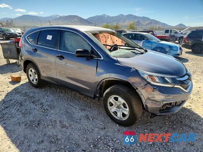 Czwarte zdjęcie samochodu z boku: 2016 HONDA CR-V LX VIN:5J6RM4H36GL129574 - miniatura