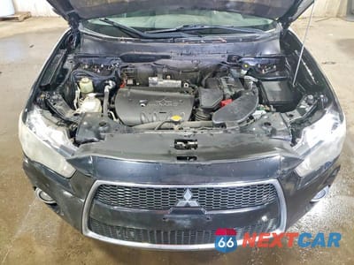 Zdjęcie 12 z 14 samochodu: 2012 MITSUBISHI OUTLANDER SE VIN:JA4JT3AW9CU009643 - miniatura