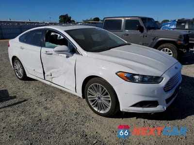 Czwarte zdjęcie samochodu z boku: 2016 FORD FUSION SE VIN:3FA6P0H96GR202317 - miniatura