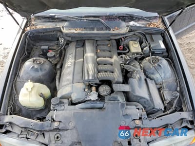 Zdjęcie 11 z 12 samochodu: 1994 BMW 325 IC AUTOMATIC VIN:WBABJ6329RJD36484 - miniatura