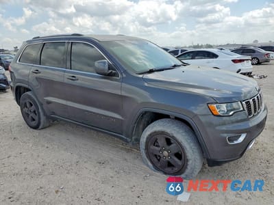 Czwarte zdjęcie samochodu z boku: 2020 JEEP GRAND CHEROKEE LAREDO VIN:1C4RJFAG4LC121166 - miniatura