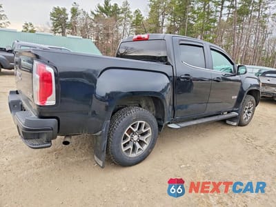 Trzecie zdjęcie samochodu z tyłu: 2015 GMC CANYON SLE VIN:1GTG6BE36F1223724 - miniatura
