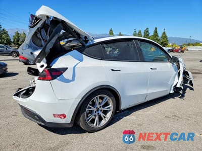 Trzecie zdjęcie samochodu z tyłu: 2023 TESLA MODEL Y VIN:7SAYGDEE9PF873819 - miniatura