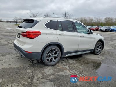 Trzecie zdjęcie samochodu z tyłu: 2017 BMW X1 XDRIVE28I VIN:WBXHT3C31H5F80509 - miniatura