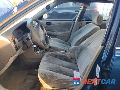 Zdjęcie 7 z 11 samochodu: 1998 TOYOTA COROLLA VIN:2T1BR18E7WC009510 - miniatura