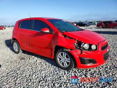 Czwarte zdjęcie samochodu z boku: 2014 CHEVROLET SONIC LT VIN:1G1JC6SB0E4235035 - miniatura