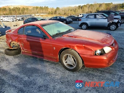 Czwarte zdjęcie samochodu z boku: 1997 FORD MUSTANG VIN:1FALP4046VF193591 - miniatura