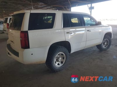 Trzecie zdjęcie samochodu z tyłu: 2019 CHEVROLET TAHOE SPECIAL SERVICE 4WD VIN:1GNSKFEC7KR128752 - miniatura