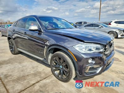 Czwarte zdjęcie samochodu z boku: 2019 BMW X6 SDRIVE35I VIN:5UXKU0C55K0H98858 - miniatura