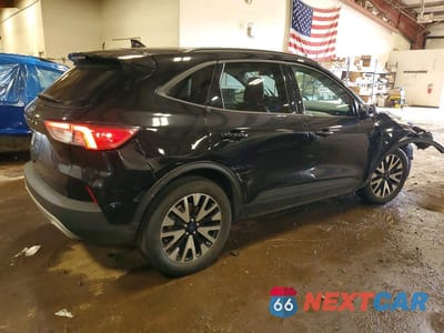 Trzecie zdjęcie samochodu z tyłu: 2020 FORD ESCAPE VIN:1FMCU9BZ7LUA60948 - miniatura