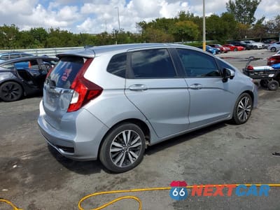 Trzecie zdjęcie samochodu z tyłu: 2018 HONDA FIT VIN:3HGGK5H84JM707456 - miniatura