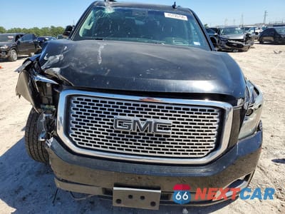 Piąte zdjęcie samochodu w środku: 2017 GMC YUKON DENALI VIN:1GKS1CKJXHR376892 - miniatura